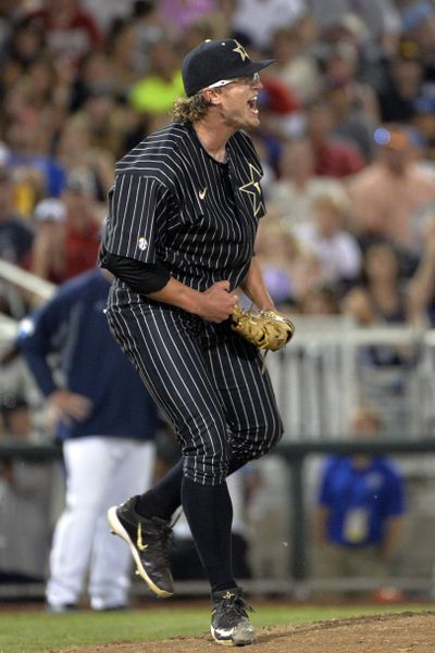 Vanderbilt pitcher Carson Fulmer celebrates an out in the Commodores College World Series finals win over Virginia. (Associated Press)