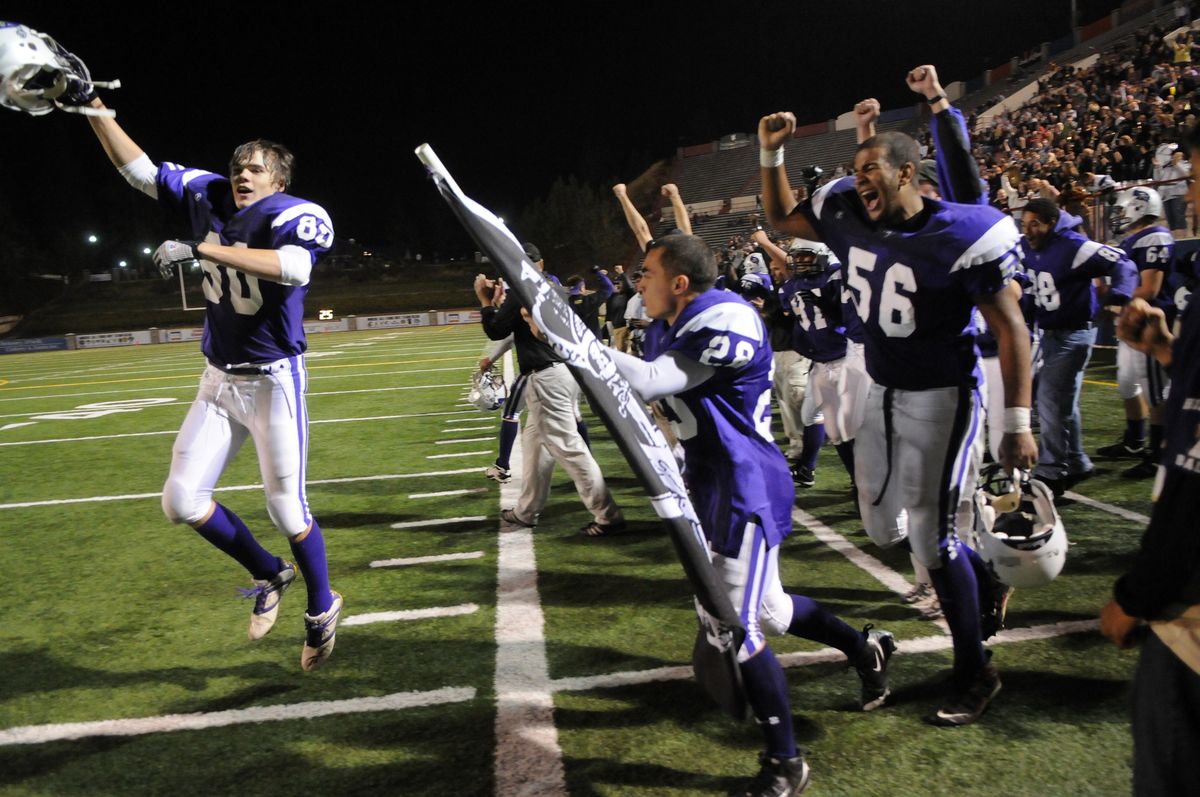 After beating North Central High School 49-7 at Joe Albi Stadium, the Rogers Pirates storm the field Friday night to celebrate their first win since the 2004 season.  (Photos by COLIN MULVANY / The Spokesman-Review)