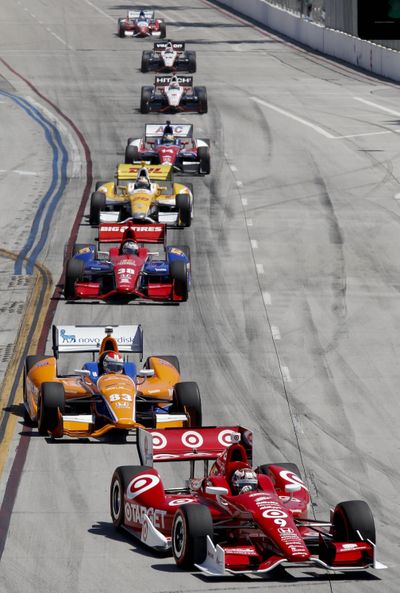 Scott Dixon leads a group of cars into the first turn at the Grand Prix of Long Beach. (Associated Press)