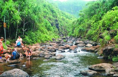 
If kayaking the Na Pali coast of Kauai, Hawaii, isn't enough exercise, you might come back the next day to hike it as well. 
 (Baltimore Sun photos / The Spokesman-Review)