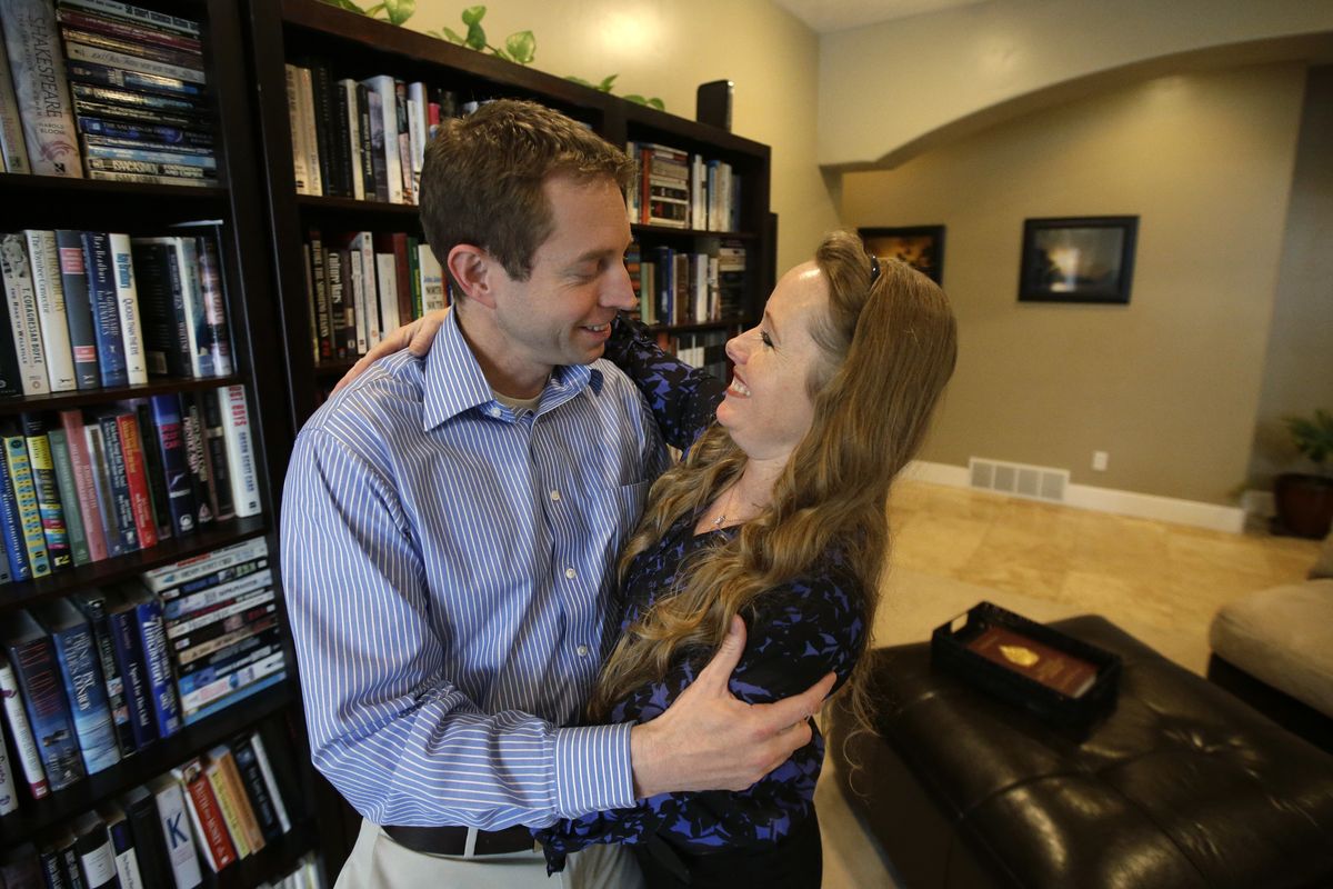 Jeff Bennion and his wife, Tanya, enjoy a quiet moment in their home Jan. 5 near Salt Lake City. (Associated Press)