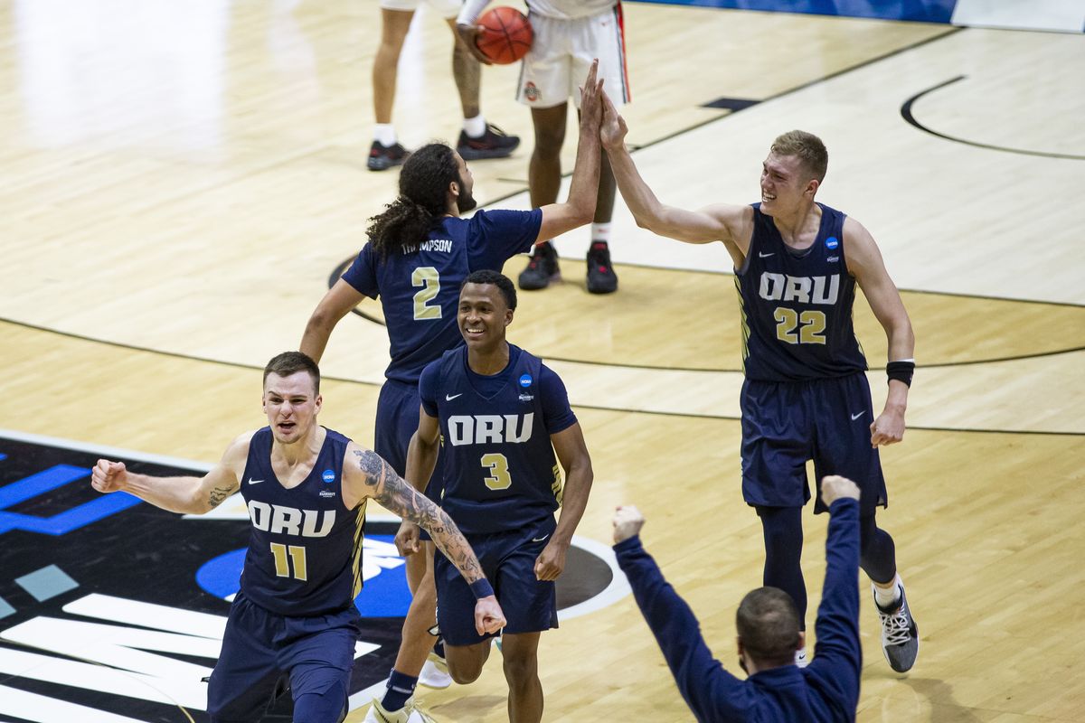 Oral Roberts players celebrate after the 15th-seeded Golden Eagles defeated second-seeded Ohio State in a first-round game of the NCAA Tournament on Friday in West Lafayette, Ind.  (Associated Press)