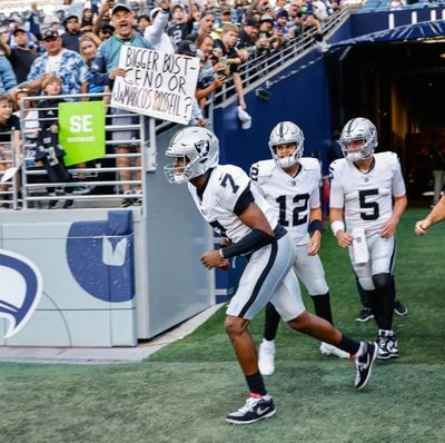 Geno Smith takes the field for the Las Vegas Raiders Thursday at Lumen Field in Seattle.  (Dean Rutz/Seattle Times)