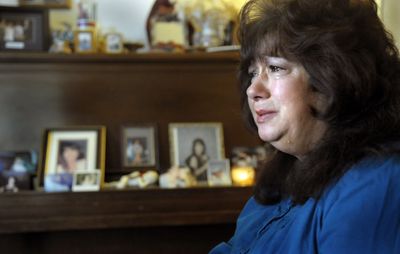 Kathy Forech keeps photos of her daughter Angela Walsh on the piano in her living room. “I just want to know why they were killed,” said Forech, who cried while describing the crime. The bodies of Walsh and Terry Palm were found in the Spokane River months after they disappeared in December 2002.   (Photos by CHRISTOPHER ANDERSON / The Spokesman-Review)