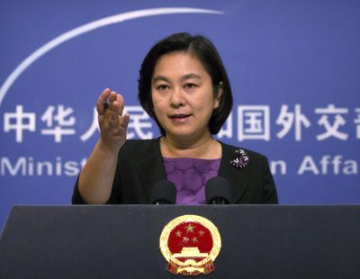 In this Sept. 15, 2017, photo, Chinese foreign ministry spokeswoman Hua Chunying gestures during a press briefing at the Ministry of Foreign Affairs building in Beijing. (Mark Schiefelbein / Associated Press)
