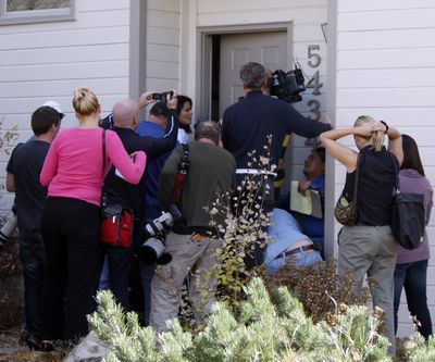 Media gather outside the front door of the home of Richard and Mayumi Heene in Fort Collins, Colo., on Friday.  (Associated Press / The Spokesman-Review)