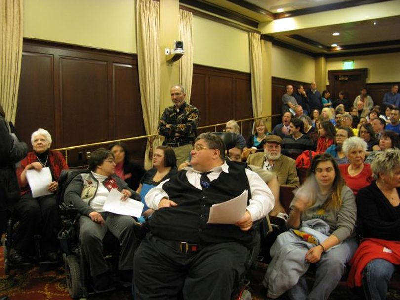 The crowd waiting to testify at Friday mornings public hearing on Health & Welfare funding includes several people in wheelchairs. Sen. Dean Cameron, R-Rupert, told the overflow crowd, 