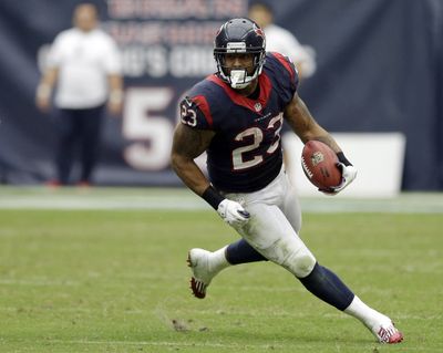 Houston Texans running back Arian Foster rushes for a gain against Seattle on Sept. 29. (Associated Press)