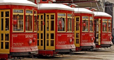 
Streetcars that ran along Canal Street are parked at the transit authority lot in New Orleans. The cars were damaged by flooding from Hurricane Katrina.  
 (Associated Press / The Spokesman-Review)
