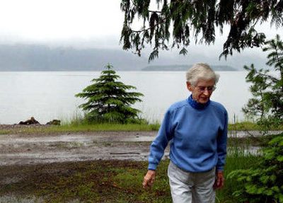 
Sue Goodner  walks Thursday near her Lake Pend Oreille property. The property's assessed value rose more than 200 percent. 
 (Kathy Plonka / The Spokesman-Review)