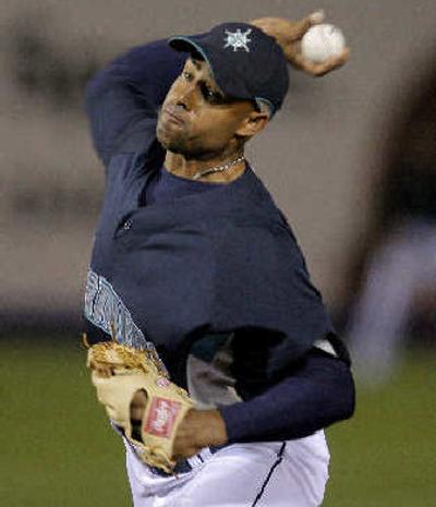 
Mariners' Miguel Batista was hit hard in Friday night's loss. 
 (Associated Press / The Spokesman-Review)