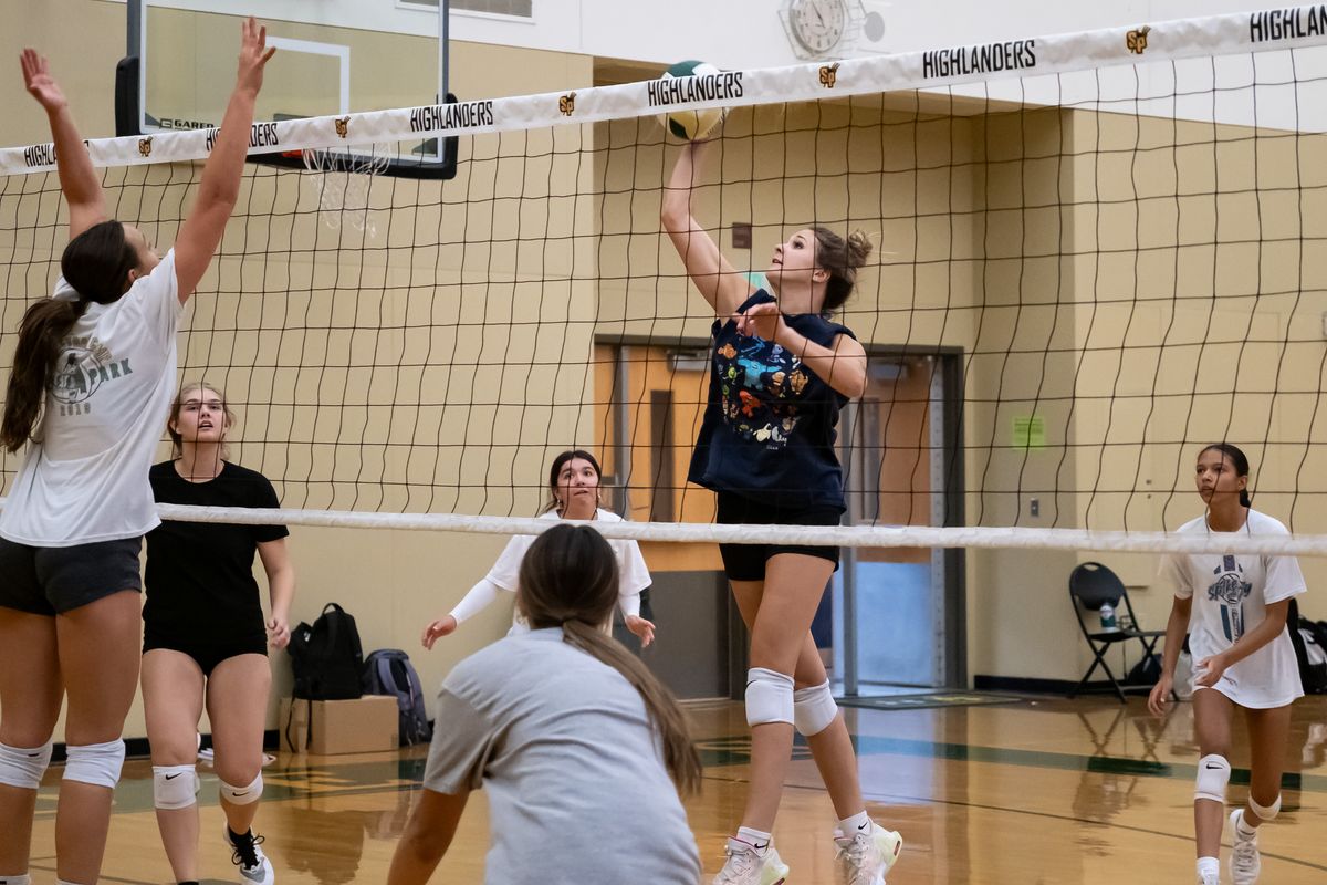 Shadle Park middle hitter Abbey Flerchinger rises for a kill during a team practice Tuesday at Shadle Park High School.  (Madison McCord/For The Spokesman-Review)