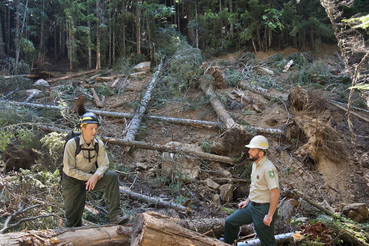 Will Young and Jason Kirchner of the U.S. Forest Service pause at the Moose Drool Watershed Restoration site in the Idaho Panhandle National Forests. The project goals are to reduce sediment, improve water quality and fish habitat. (Dan Pelle)