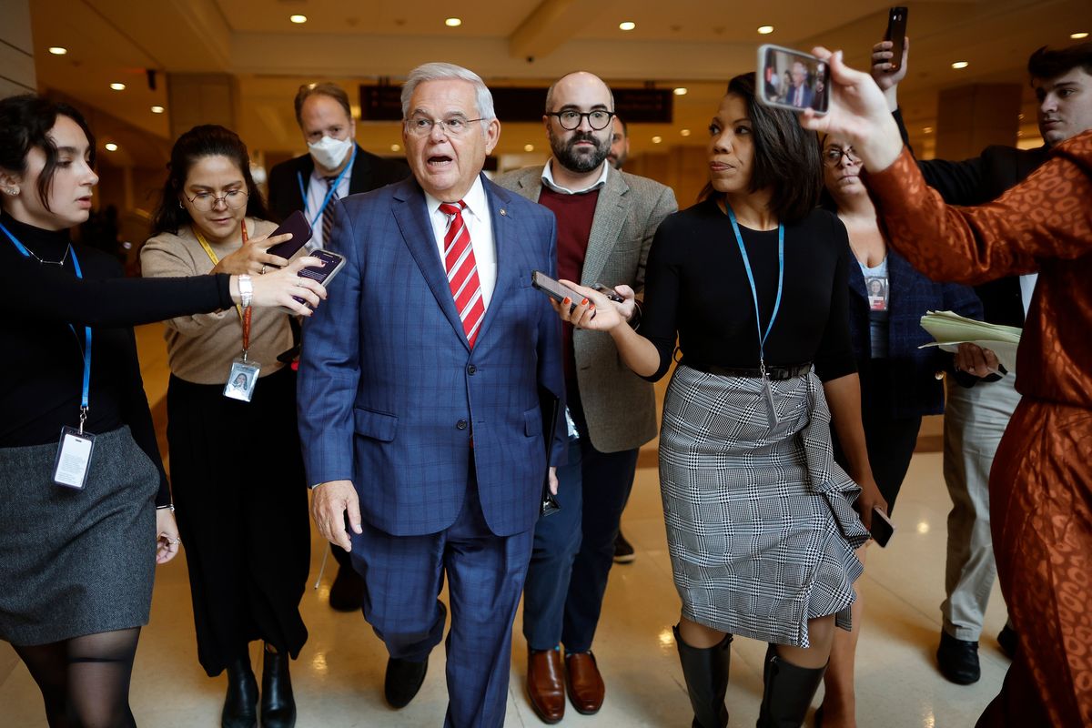 Above: Sen. Bob Menendez, D-N.J., talks to journalists Sept. 28 after addressing a closed Democratic caucus meeting at the U.S. Capitol in Washington, D.C. Left: Nadine Menendez, left, wife of Sen. Bob Menendez, arrives Oct. 2 at Manhattan Federal Court in New York City. (Chip Somodevilla)