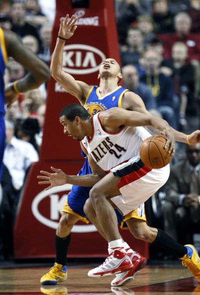 Andre Miller (24) and the Blazers are headed to the playoffs. (Associated Press)