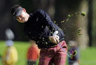 
Rory Sabbatini hits his approach shot on the third hole at the Nissan Open.  
 (Associated Press / The Spokesman-Review)