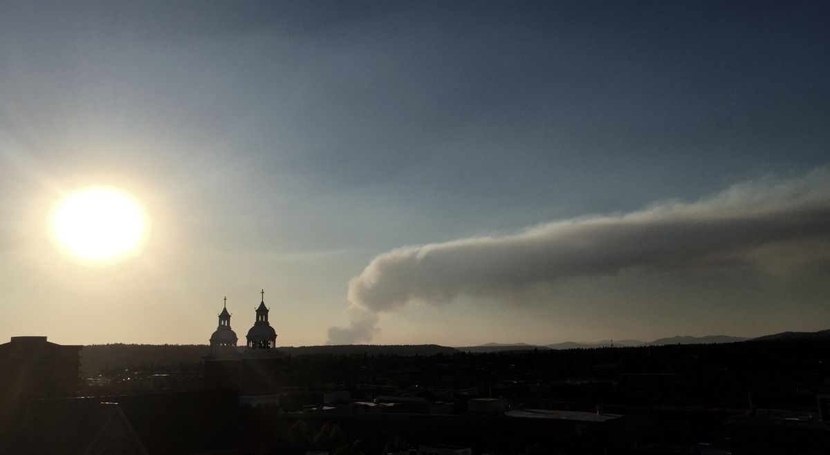 A fire just south of Long Lake in northwest Spokane County grew quickly on Friday, July 31, 2015 to hundreds of acres. The plume was easily visible from downtown Spokane. (Rick House / The Spokesman-Review)