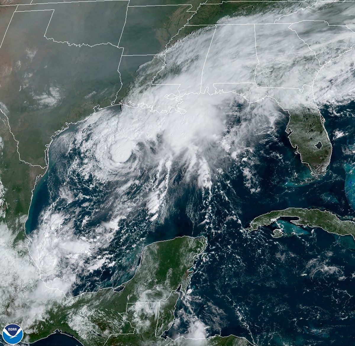 This GOES-16 GeoColor satellite image, taken Saturday and provided by NOAA, shows Tropical Storm Beta, center, in the Gulf of Mexico.  (HOGP)