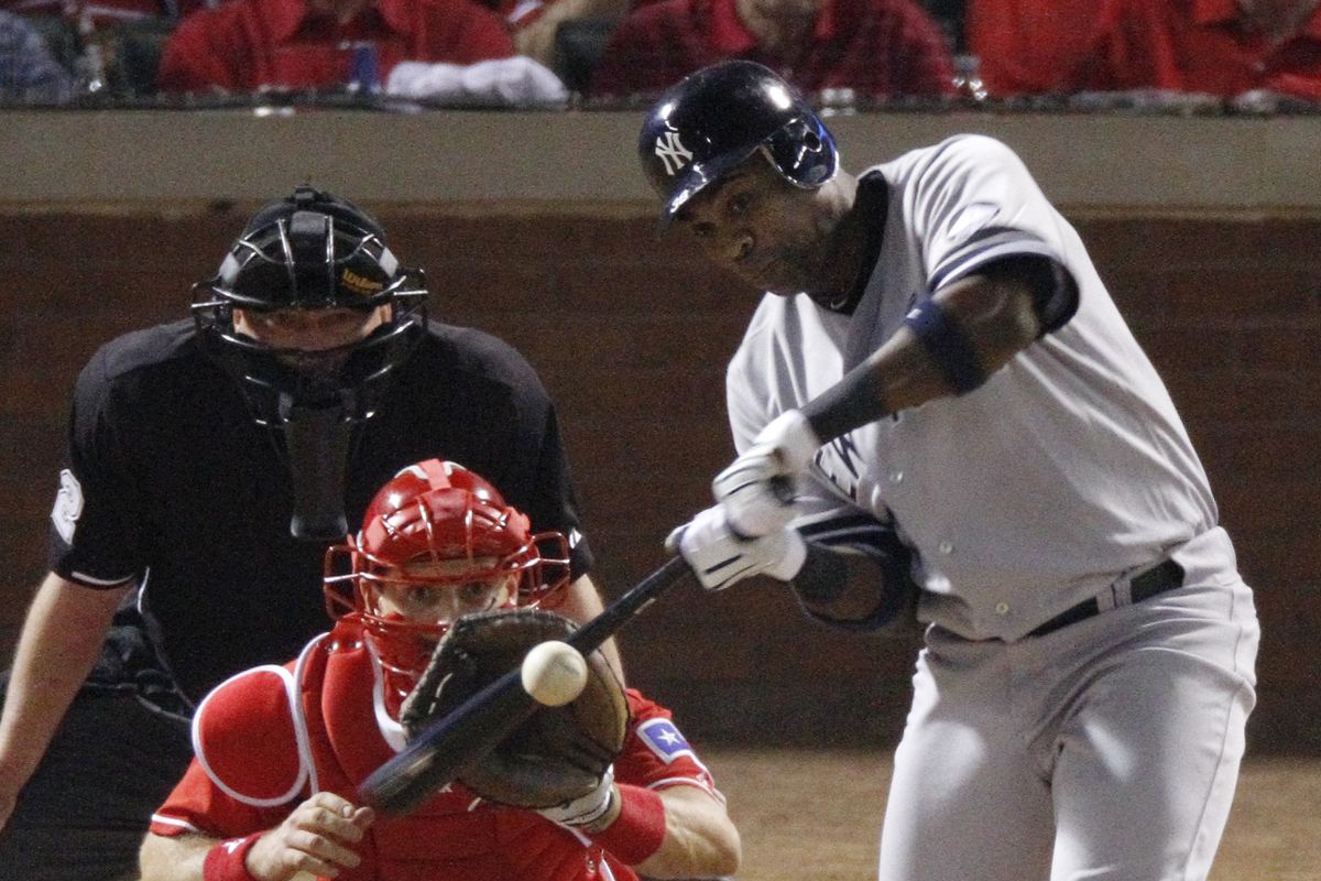 Marcus Thames contributes a run-scoring single to the Yankees’ five-run eighth inning. (Associated Press)