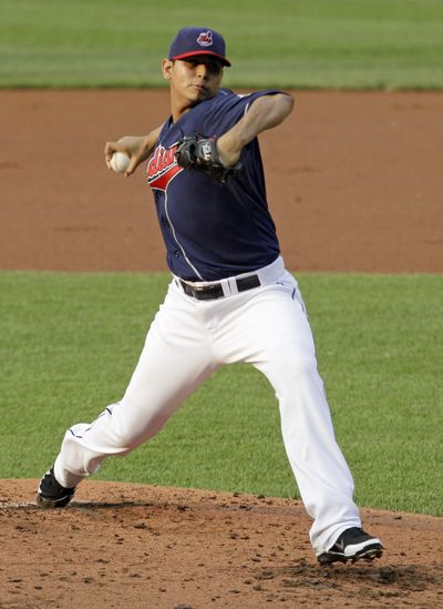 Cleveland’s Carlos Carrasco gave up three hits and struck out six over 8 1/3 innings (Associated Press)