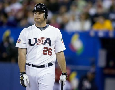 Chris Iannetta and Team USA were disappointed by Wednesday’s loss to Venezuela.  (Associated Press / The Spokesman-Review)