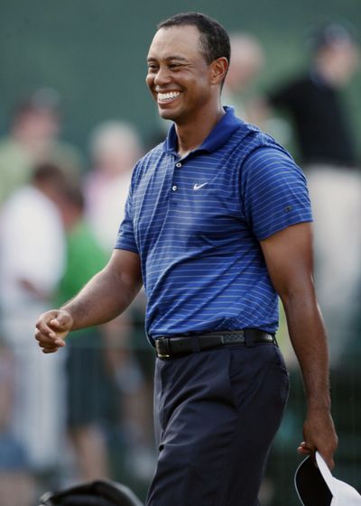 Tiger Woods sits one shot back at the PGA’s Tour Championship.  (Associated Press / The Spokesman-Review)