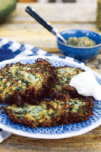 
Zucchini Fritters are simple, fried savory patties which can be eaten as is with salsa and sour cream, or wrapped in flat bread with a bit of tzatziki, a Greek yogurt and dill spread. Zucchini Fritters are simple, fried savory patties which can be eaten as is with salsa and sour cream, or wrapped in flat bread with a bit of tzatziki, a Greek yogurt and dill spread. 
 (Associated PressAssociated Press / The Spokesman-Review)