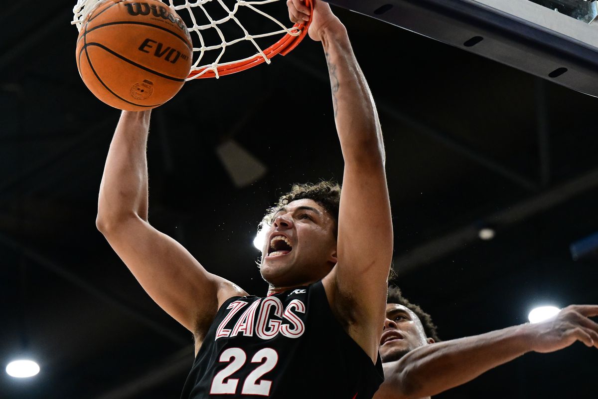 Gonzaga Bulldogs forward Anton Watson (22) dunks the ball against the Pepperdine Waves during the second half of a college basketball game on Saturday, Feb 18, 2023, at Firestone Fieldhouse in Malibu, Calif. Gonzaga won the game 97-88.  (Tyler Tjomsland/The Spokesman-Review)