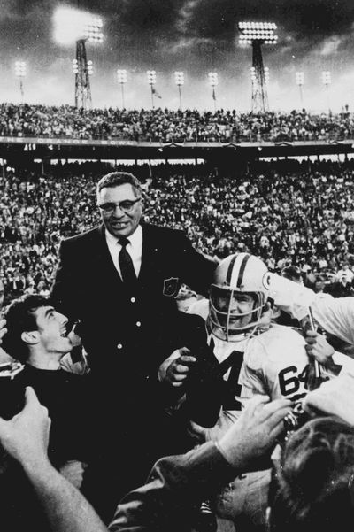 Green Bay Packers coach Vince Lombardi is carried off the field Jan. 14, 1968 after his team defeated the Oakland Raiders 33 to 14 in Super Bowl II, in Miami, Fla.  Packers guard Jerry Kramer (64) provides one of the shoulders for Lombardi's ride. Kramer will return to his hometown of Sandpoint for a special presentation on Friday. (Associated Press)
