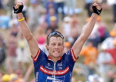
American Lance Armstrong is pumped up after winning the 13th stage of the Tour de France on Saturday. 
 (Associated Press / The Spokesman-Review)