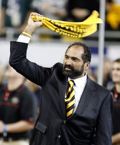 Franco Harris waves a Pittsburgh Steelers' 