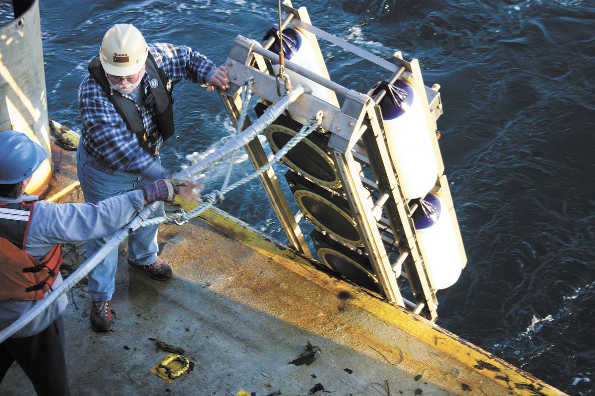 In this Dec. 12, 2011 photo, workers lower equipment off the marine research vessel Bluefin to carry out a seismic ocean survey near Avila Beach, Calif. State and federal officials are juggling concerns over endangered whales and other marine life with public safety as they mull over plans to use massive air canons to create new earthquake fault maps in two state marine reserves off the Central Coast. Pacific Gas & Electric Co. wants to use the canons to make maps of shoreline fault zones recently discovered near its Diablo Canyon nuclear power plant. The massive reverberations caused by the air canons is picked up by sensors placed in the water, allowing scientists to gain detailed data about the makeup of the seafloor and faults. (Joe Johnston / The Tribune (of San Luis Obispo))
