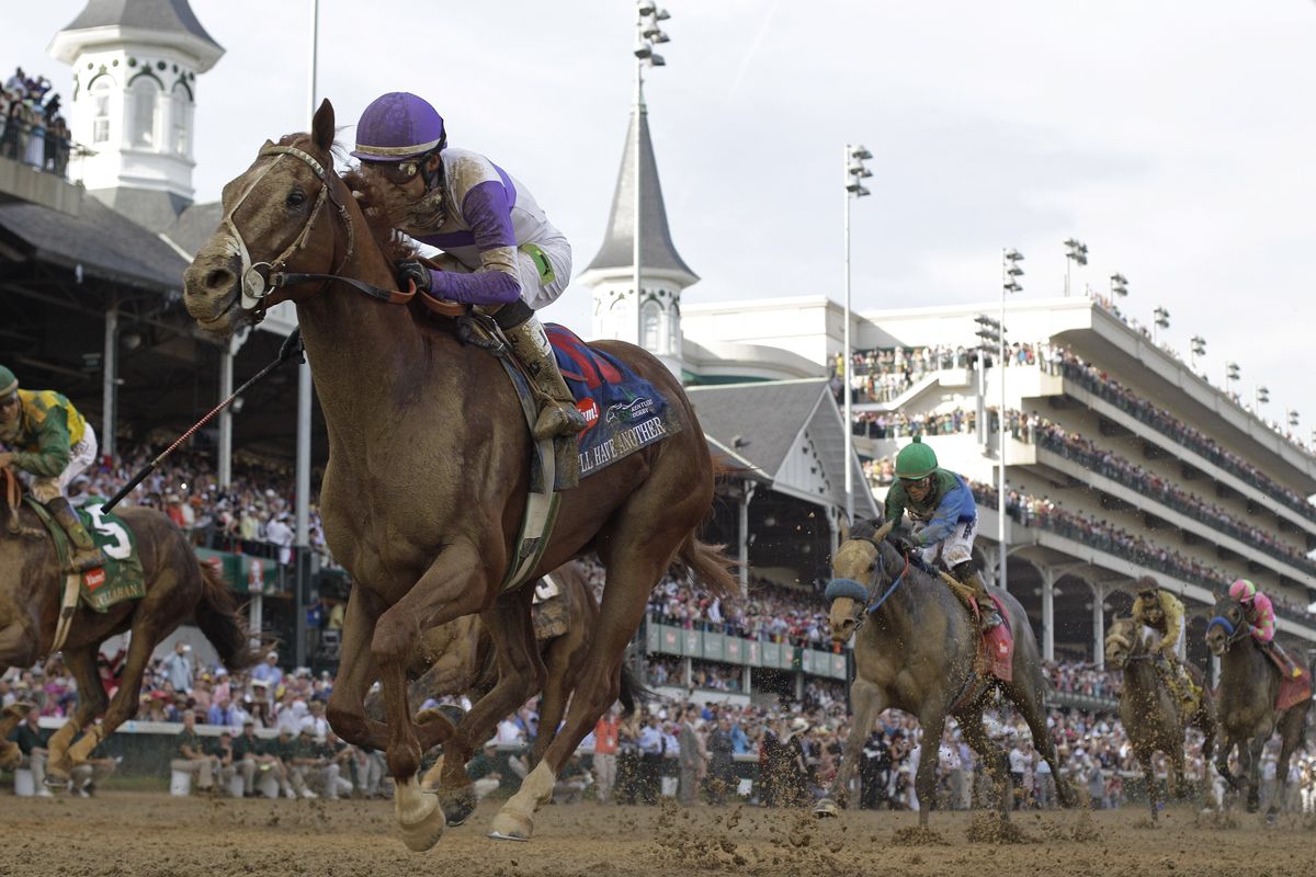 Jockey Mario Gutierrez guides I’ll Have Another to victory Saturday in the 138th Kentucky Derby at Churchill Downs. (Associated Press)