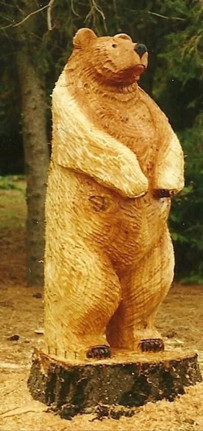 This wooden bear statue was reported stolen from a home in Cedar Mill, Ore. (Associated Press)