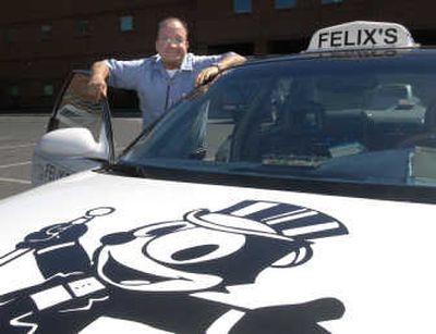 
Felix Gaudreau, owner of Felix's Taxi in Spokane,  drives a cab with 555,000 miles on it. The City Council is considering that cabs be required to have less than 350,000 miles on them. 
 (Dan Pelle / The Spokesman-Review)
