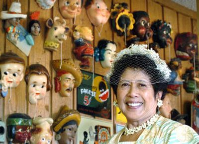 
Gloria Vogel with her collection of string holders. 
 (The Spokesman-Review)