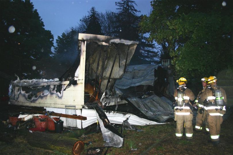 This Spokane Valley mobile home was completely destroyed in a fire just after 4 a.m. on July 13, 2011.  (Photo courtesy Spokane Valley Fire Department)