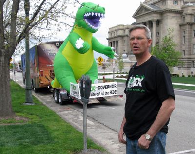 Rex Rammell campaigns for governor of Idaho in 2010 with the help of a giant, inflatable Tyrannosaurus rex and a decorated RV. (File)