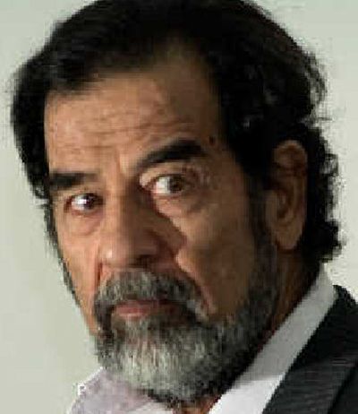
Many Iraqis believe a guilty verdict in the trial of Saddam Hussein is assured. 
 (File/Associated Press / The Spokesman-Review)