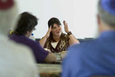 
Rabbi Jessy Gross gestures while making a discussion point during a luncheon at the Unitarian Univeralist Church in Spokane.
 (The Spokesman-Review)