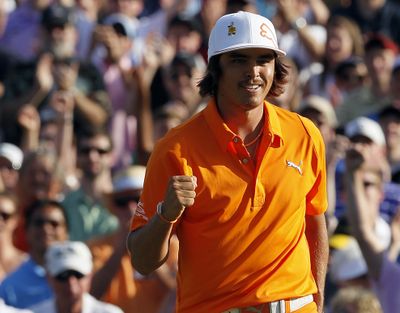 Rickie Fowler reacts after garnering his first career PGA Tour tournament victory. (Associated Press)