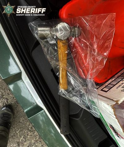 A 39-year-old man, Cole L. Healy, is accused of throwing this hammer through an open window of a passing vehicle, striking an 8-year-old boy in the forehead Monday near Spokane Valley. Healy was arrested for suspicion of first-degree assault and two counts of possession of an incendiary device.  (Courtesy of Spokane County Sheriff's Office)