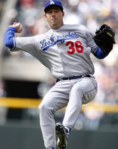 Pitcher Greg Maddux won his 18th Gold Glove, a record.  (Associated Press / The Spokesman-Review)