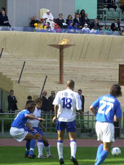 
Pope John Paul II takes in an Italian soccer match at Rome's Olympic Stadium in 2000. 
 (Associated Press / The Spokesman-Review)