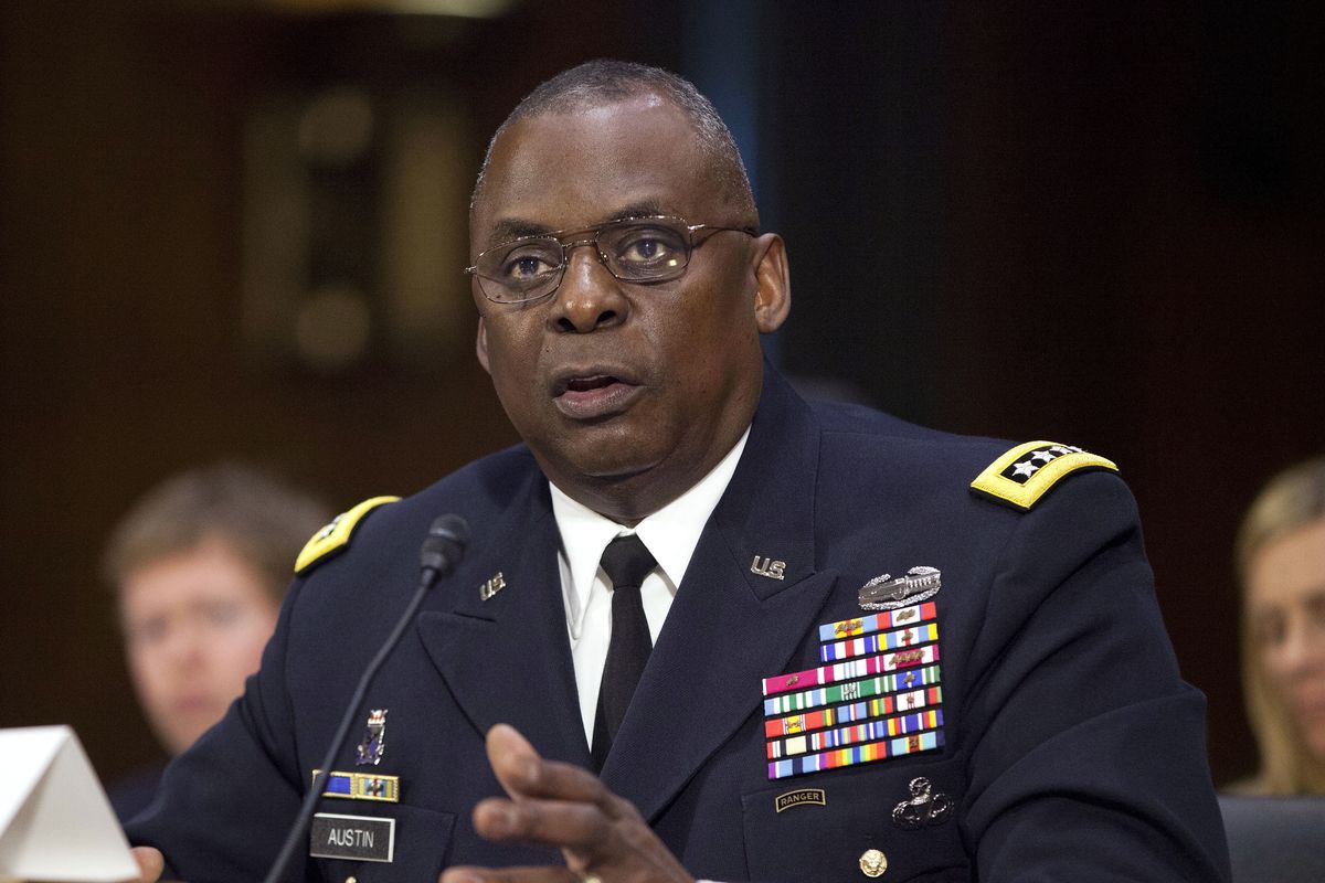 FILE - In this Sept. 16, 2015, photo, U.S. Central Command Commander Gen. Lloyd Austin III, testifies on Capitol Hill in Washington. Biden will nominate retired four-star Army general Lloyd J. Austin to be secretary of defense. That