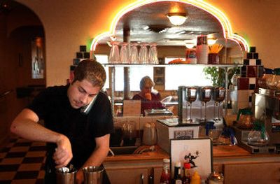 
Top Notch Cafe owner Cliff Daigler filled an order Wednesday. 
 (Brian Plonka / The Spokesman-Review)