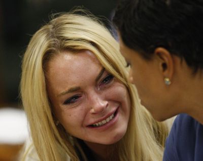 Lindsay Lohan cries after being sentenced to 90 days. (Associated Press)