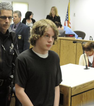 Zachary Neagle is led away from the courtroom after his sentencing May 12, 2010 at Canyon County Courthouse in Caldwell, Idaho. In May 2009, Neagle killed his 32-year-old father, Jason Neagle, in their Caldwell home. When his defense argued that years of sexual abuse prompted the killing, national and international news outlets swarmed to Canyon County to cover the story of a 14-year-old who said he did it to protect his siblings. (Mike Vogt / Mike Vogt/The Idaho Press-Tribune)