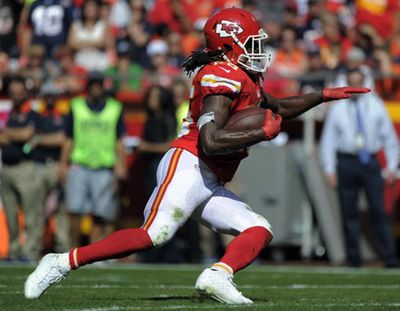 In this Oct. 11, 2015, file photo, Kansas City Chiefs running back Jamaal Charles carries the ball during the second half of an NFL football game against the Chicago Bears in Kansas City, Mo. Charles is scheduled to visit with the Denver Broncos on Tuesday, May 2, 2017. If his surgically repaired right knee checks out, Charles could be joining their fierce divisional rival. (Ed Zurga / Associated Press)