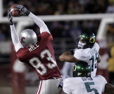 
WSU receiver Jason Hill brings in a catch for a first down in the first half against Oregon in Martin Stadium. 
 (Christopher Onstott/ / The Spokesman-Review)